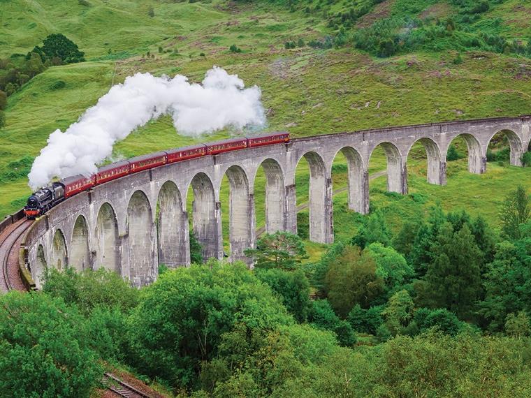 The Jacobite Steam Train cutting through the Scottish countryside