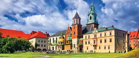 Colourful buildings set against a cloudy sky, Poland