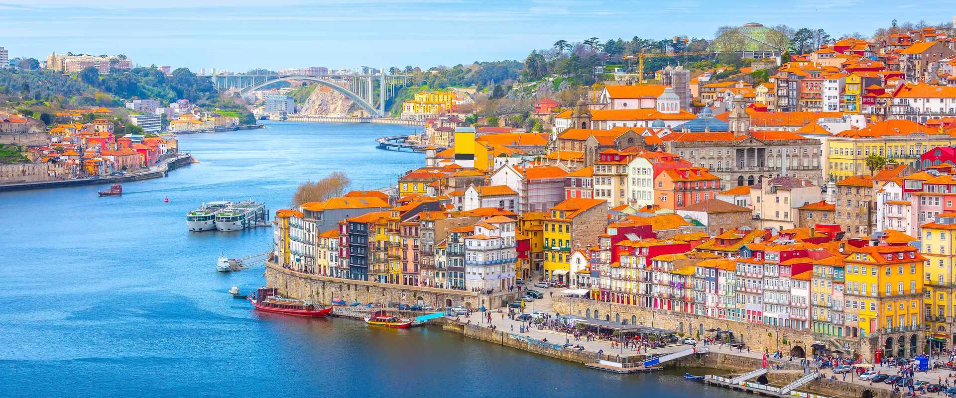 Vibrant buildings lining the Douro River known as Porto, Portugal  