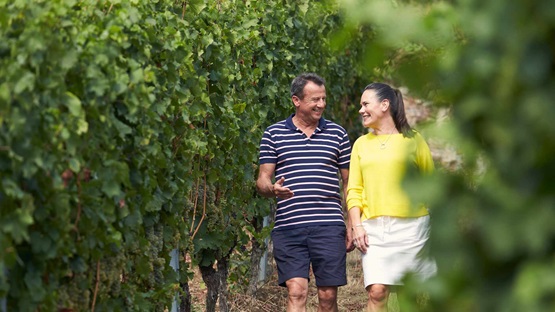 View of couple exploring vineyards in Miltenberg, Germany
