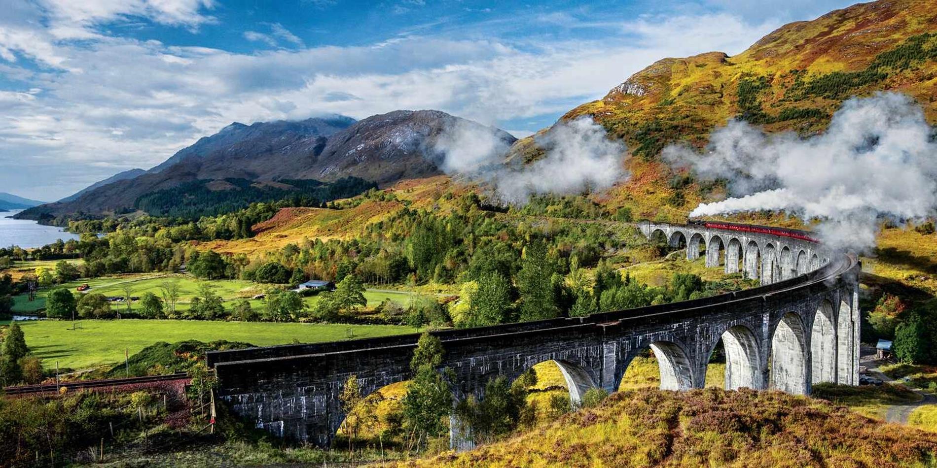 Jacobite Steam Train travelling over the Glenfinnan Viaduct, Scotland