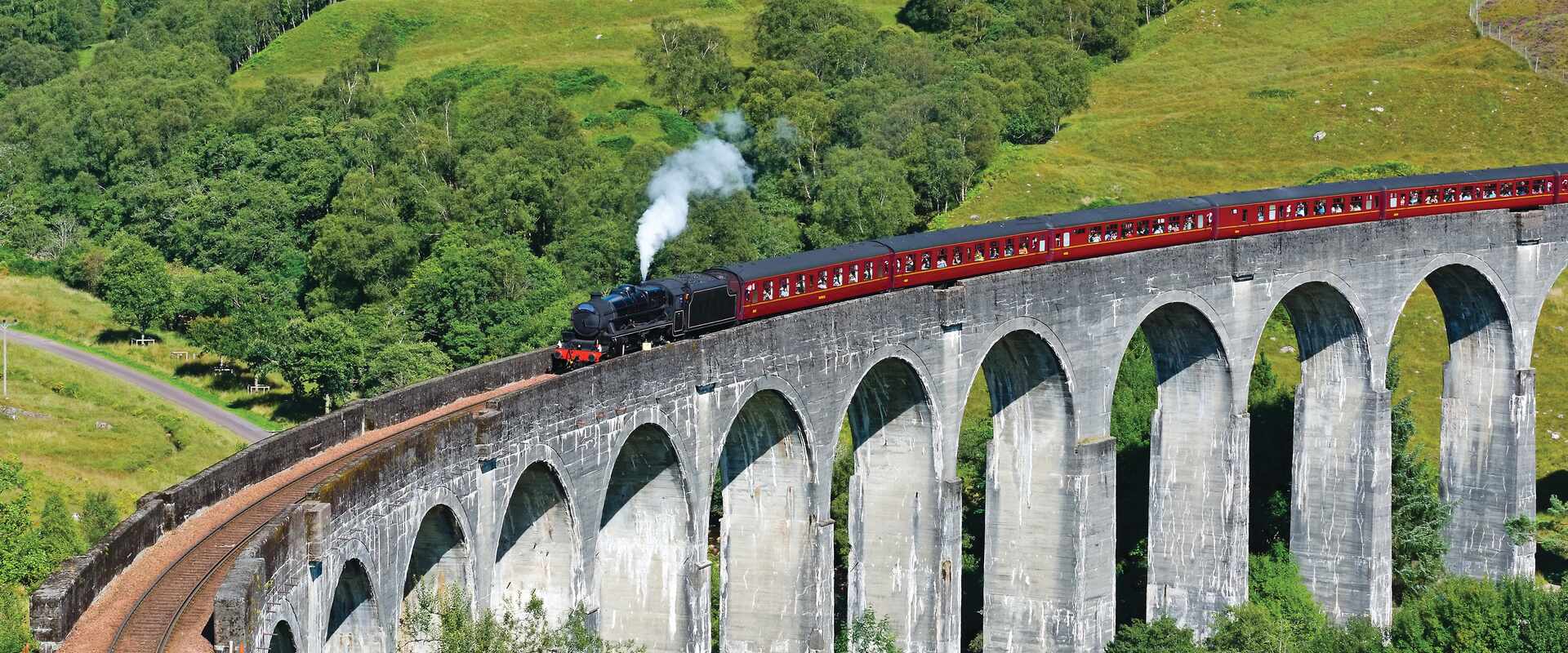 Jacobite Steam Train travelling over the Glenfinnan Viaduct