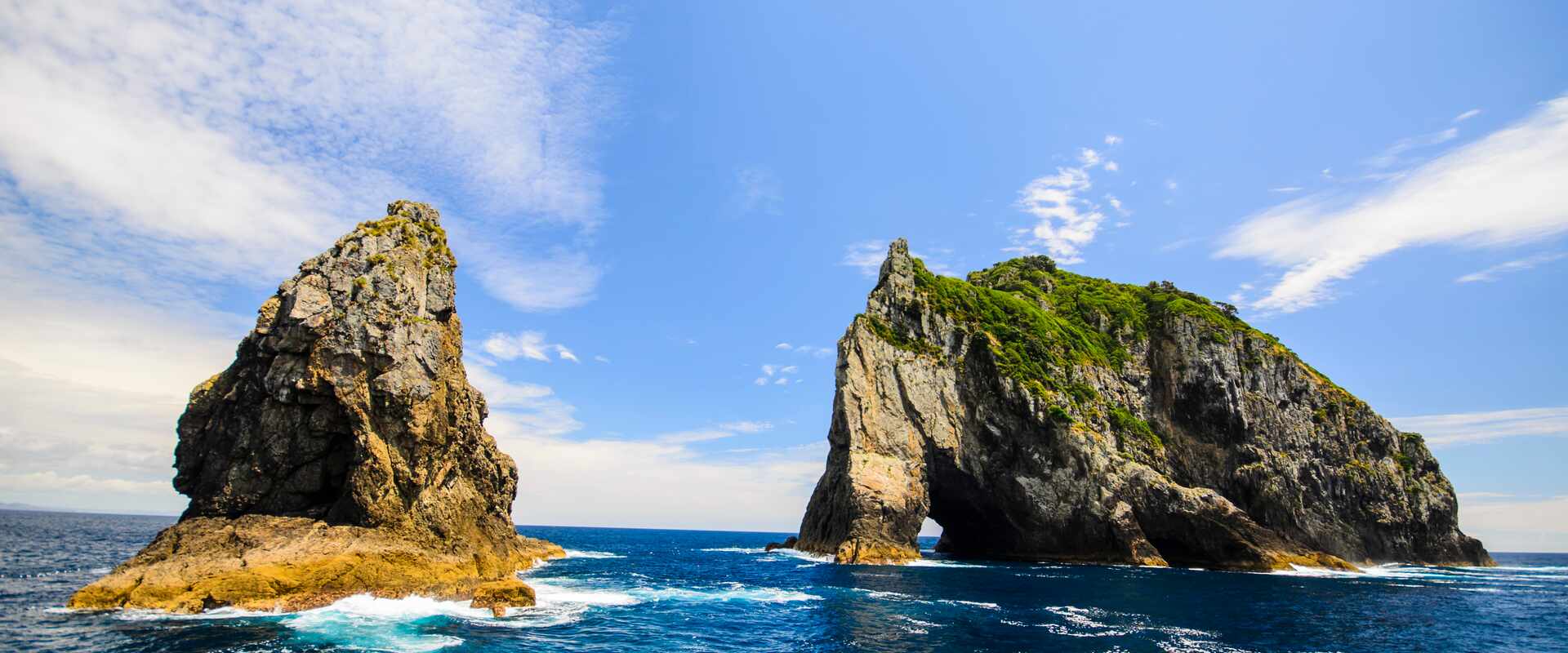 Small upright rocky islands, part of the Bay of Islands located in New Zealand