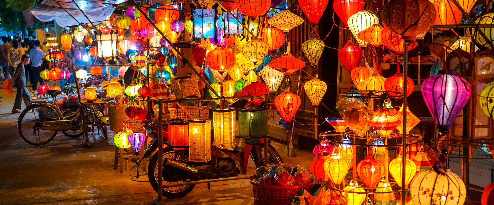 Lanterns a glow in local market, Hoi An, Vietnam