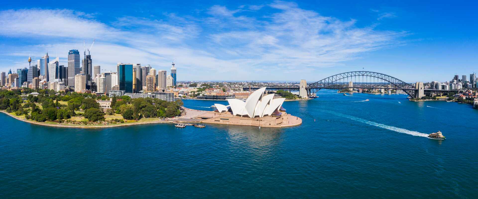 sydney harbour opera house cbd and bridge by day new south wales australia