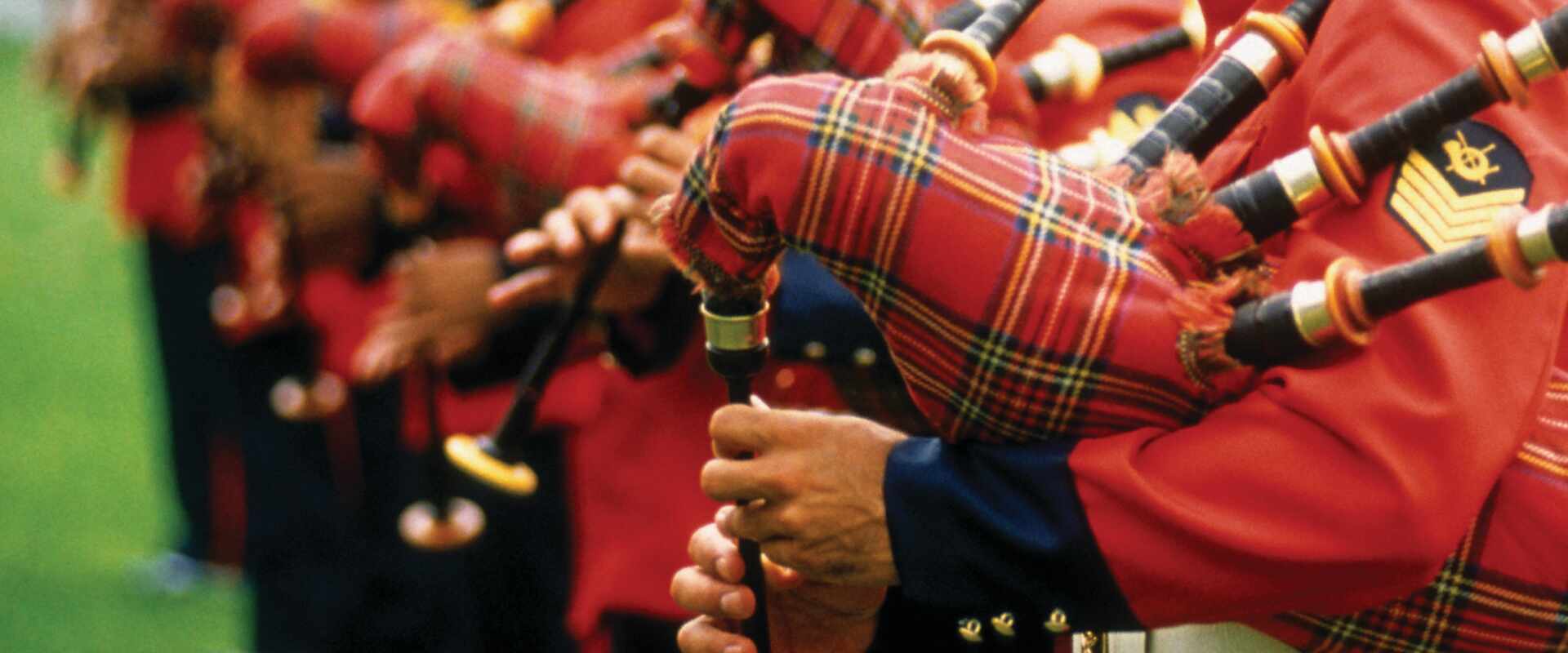 close up bagpipes playing scotland